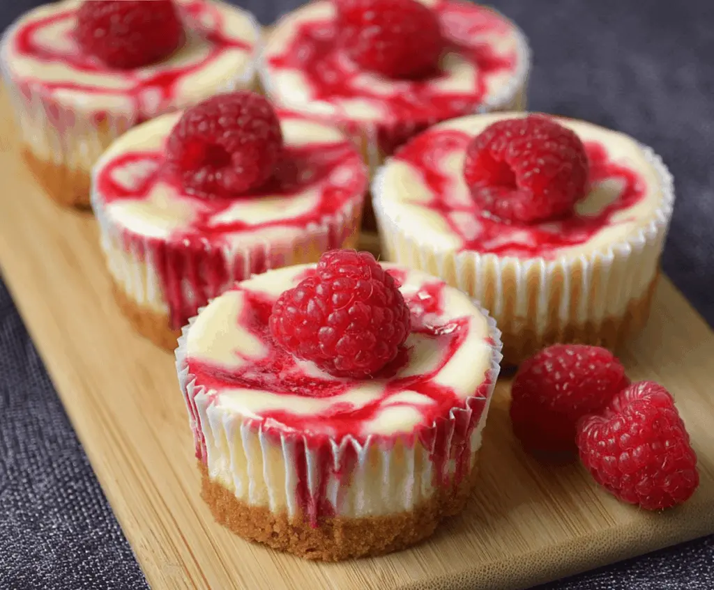 Delicious Raspberry Cheesecake Cupcakes with fresh raspberries and creamy cheese frosting