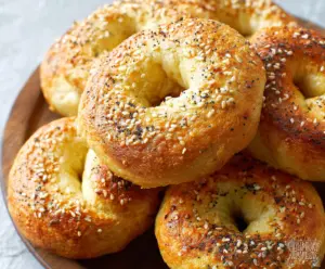 Delicious homemade keto bagels with a golden-brown crust and sesame seeds on top.